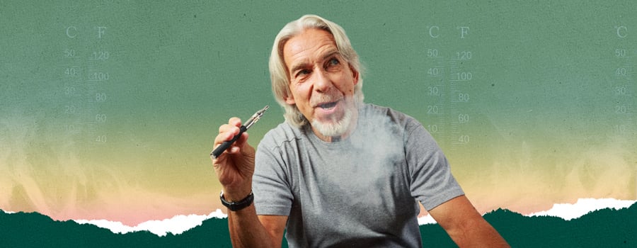 Senior man with gray hair and beard using a vape pen, temperature scales in the background, wearing a gray t-shirt, vaping image for temperature control.